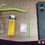 Barang bukti dugaan kasus narkotika berupa alat hisap, korek api, plastik klip dan telepon seluler yang diamankan polisi di Manding Sumenep